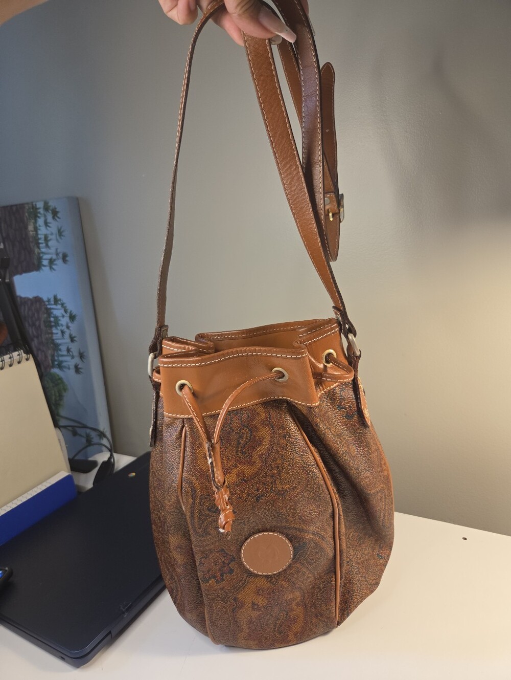 Vintage Mila Schön bucket bag features brown Etro paisley on canvas/leather